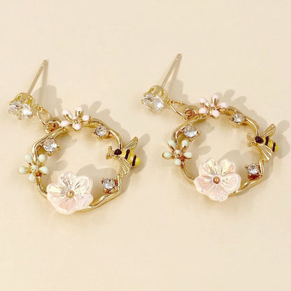 Boucles d'oreilles femmes avec design de fleur (paire)