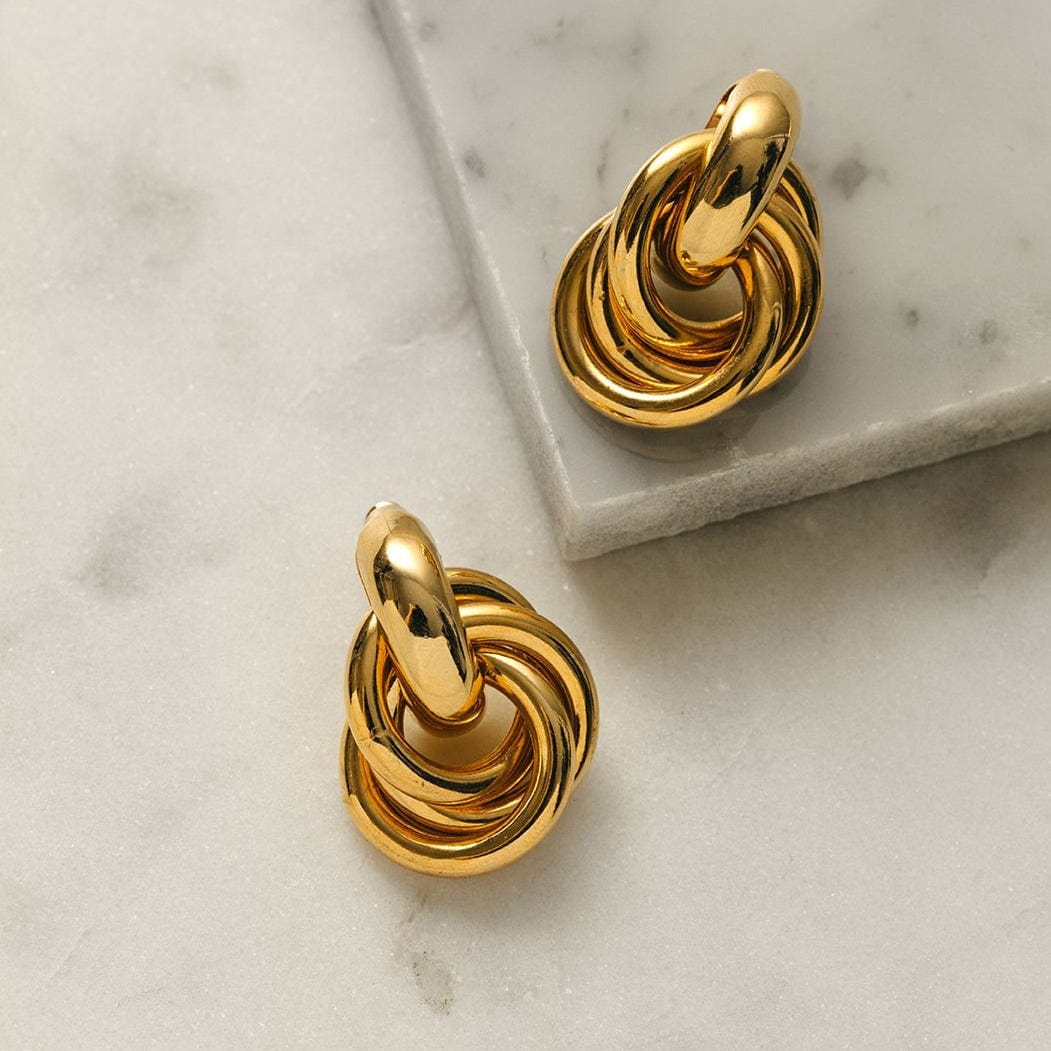 Rania – Boucles Dorées Design Entrelacé