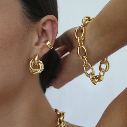 Rania – Boucles Dorées Design Entrelacé